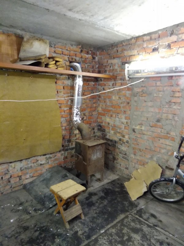 Гараж из пеноблоков с буржуйкой