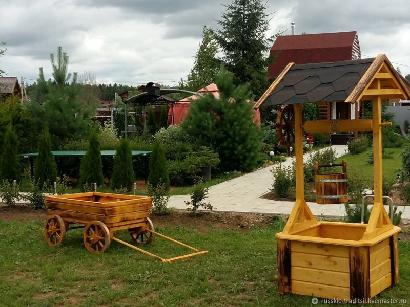 Колодец из колес для сада