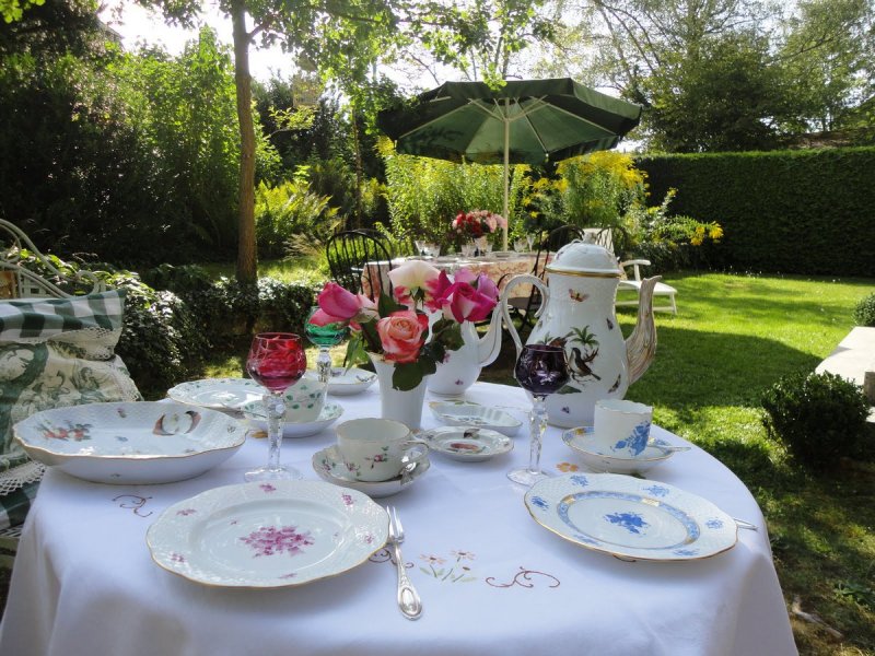 Guests at a Table in the Garden