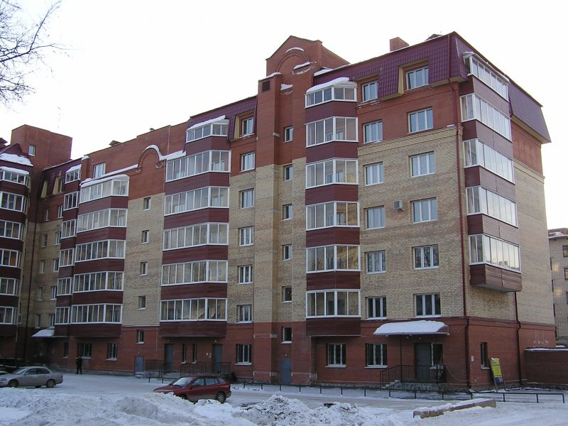 Кирпичный многоквартирный дом