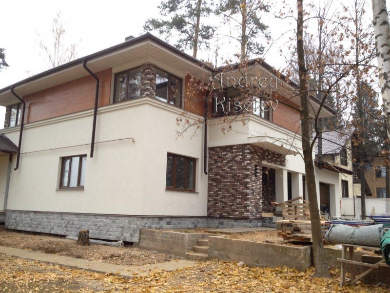 Комбинированные фасады коттеджей