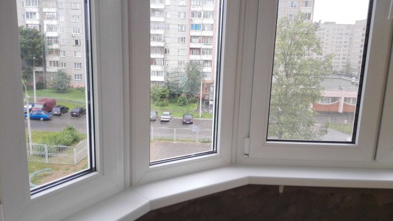 Окна на балкон Рехау