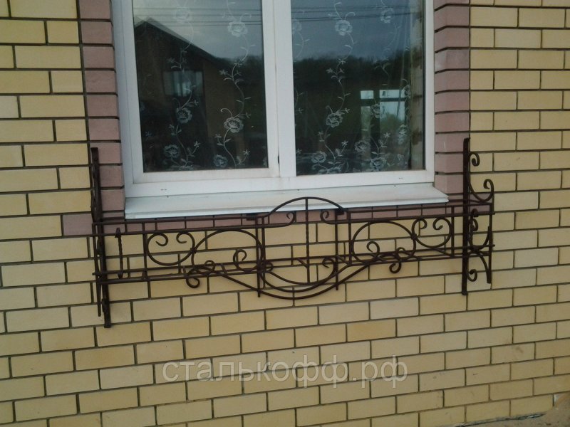 Кованый балкон в частном доме