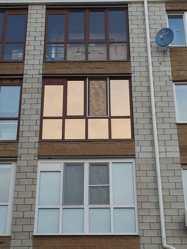 Тонированные пластиковые окна
