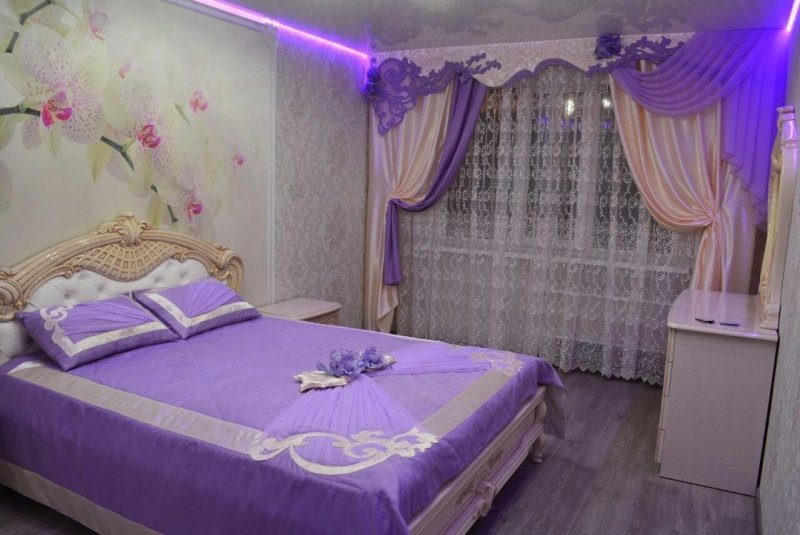 Фиолетовые шторы в спальню