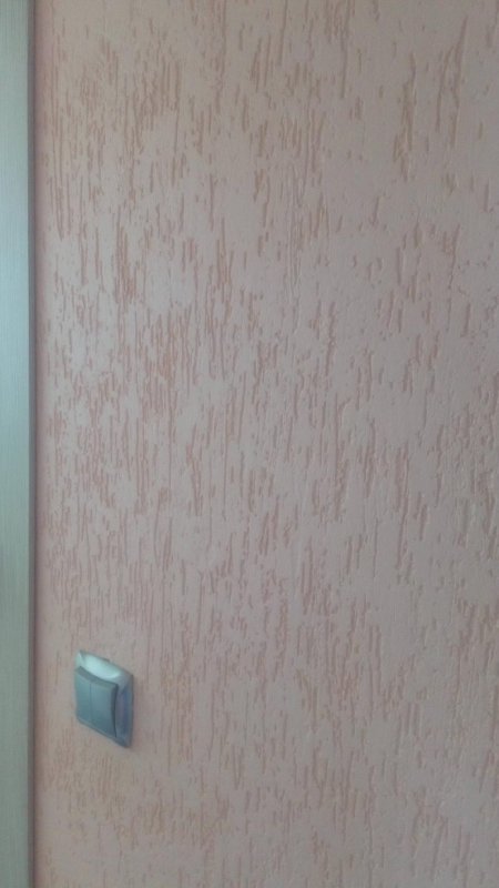 Сочетание декоративного камня и декоративной штукатурки