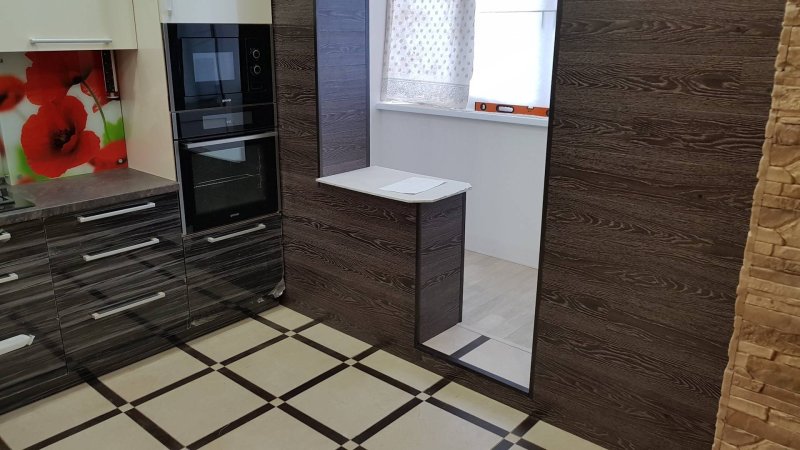 Отделка стен ламинатом на кухне