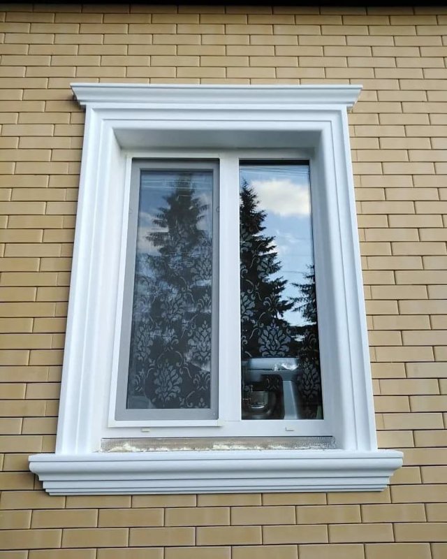 Обрамление окон камнем