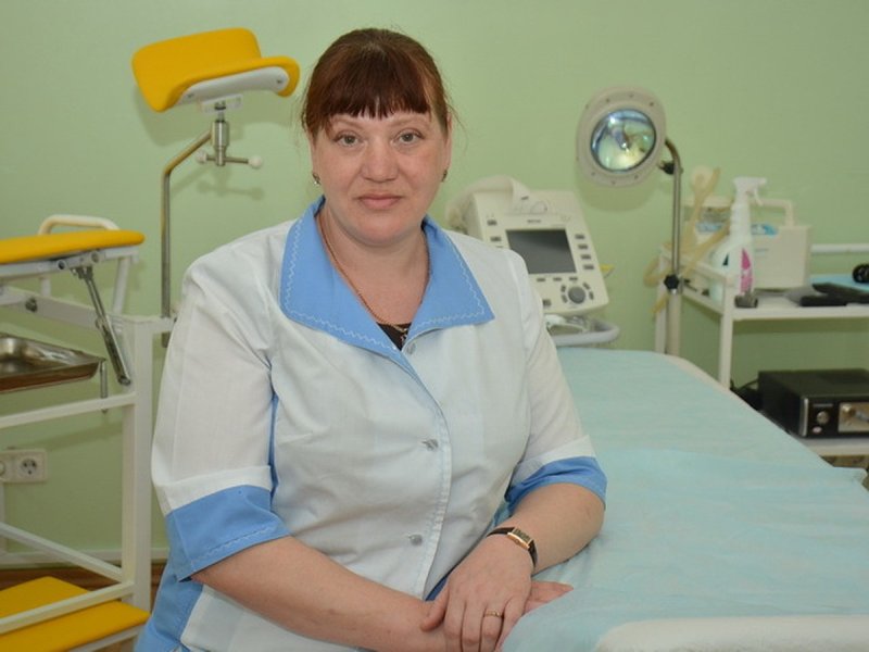 Женщина на гинекологическом кресле