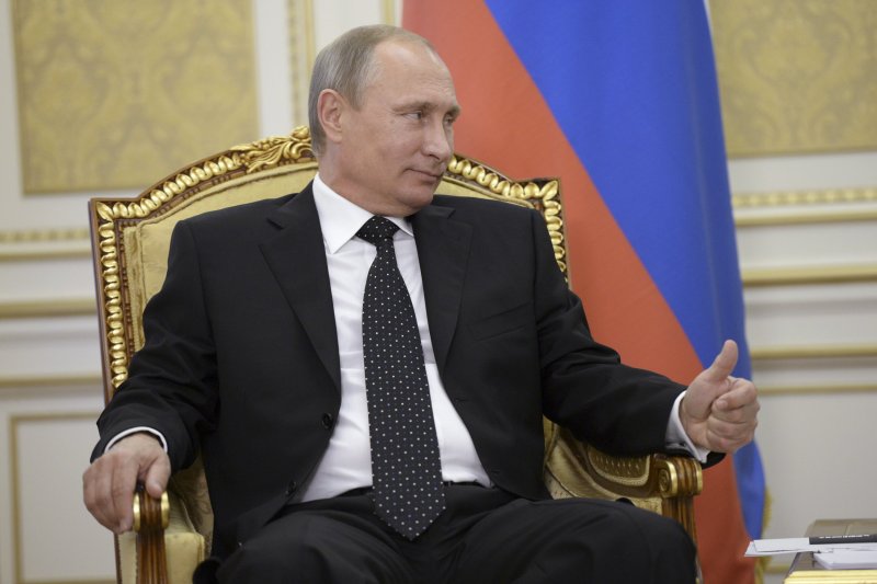 Путин Владимир президент в кресле