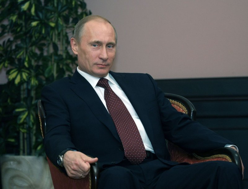 Путин Владимир Владимирович в кресле