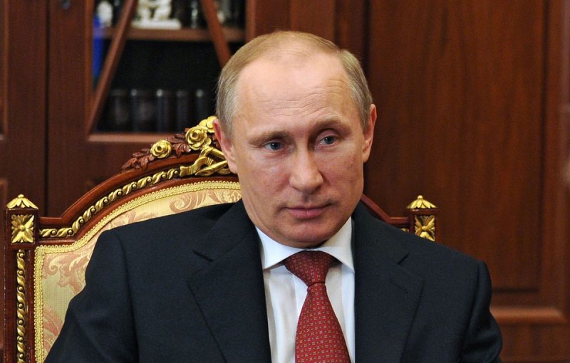Путин в кресле