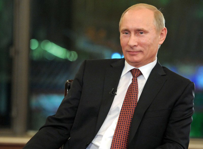 Путин в кресле