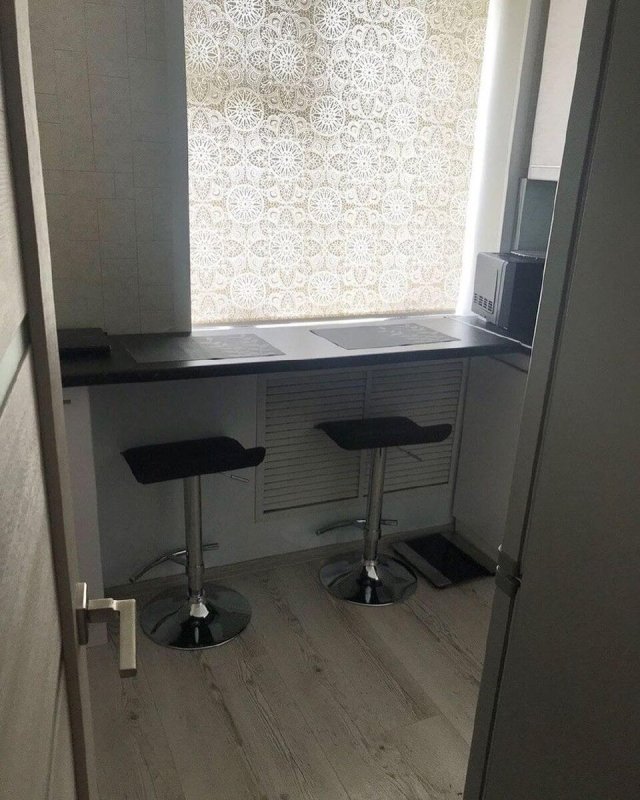 Арки в хрущевке на кухне с барной стойкой
