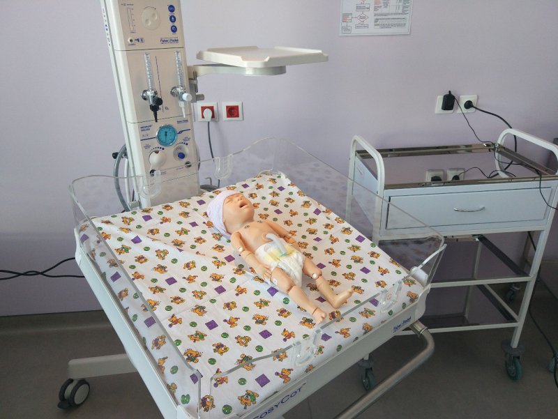Роженица в родильном зале