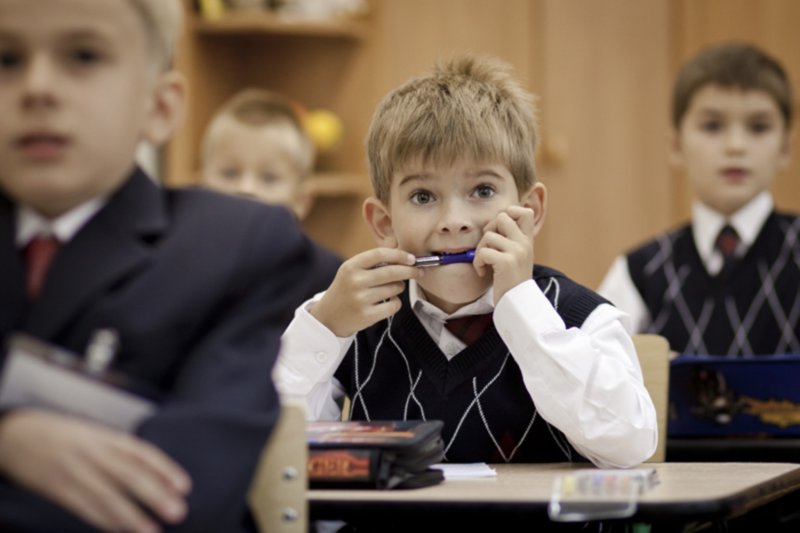 Первоклассник за партой